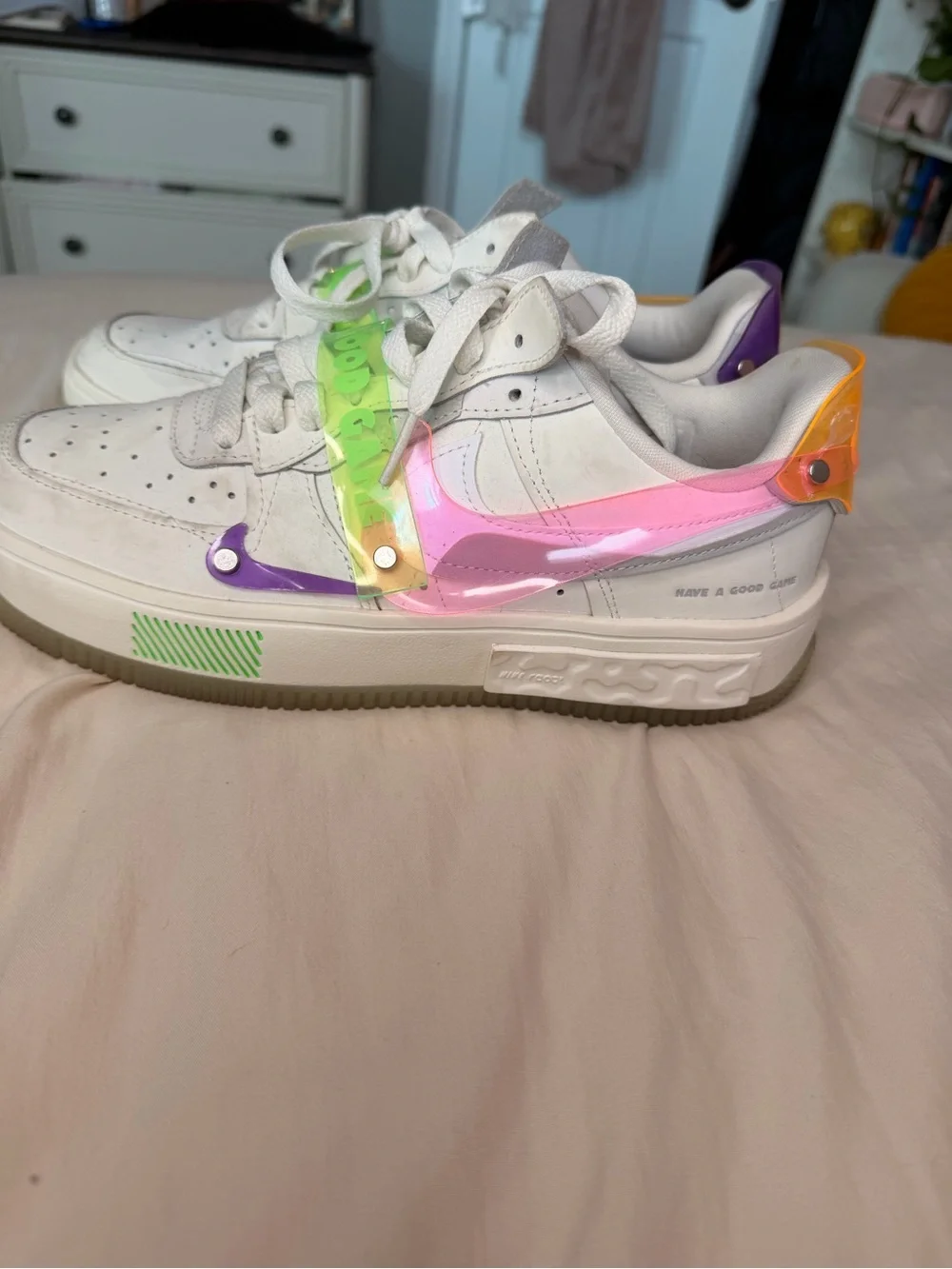 Nike White Sneakers with Neon Pink, Green, Purple, and Orange Accents